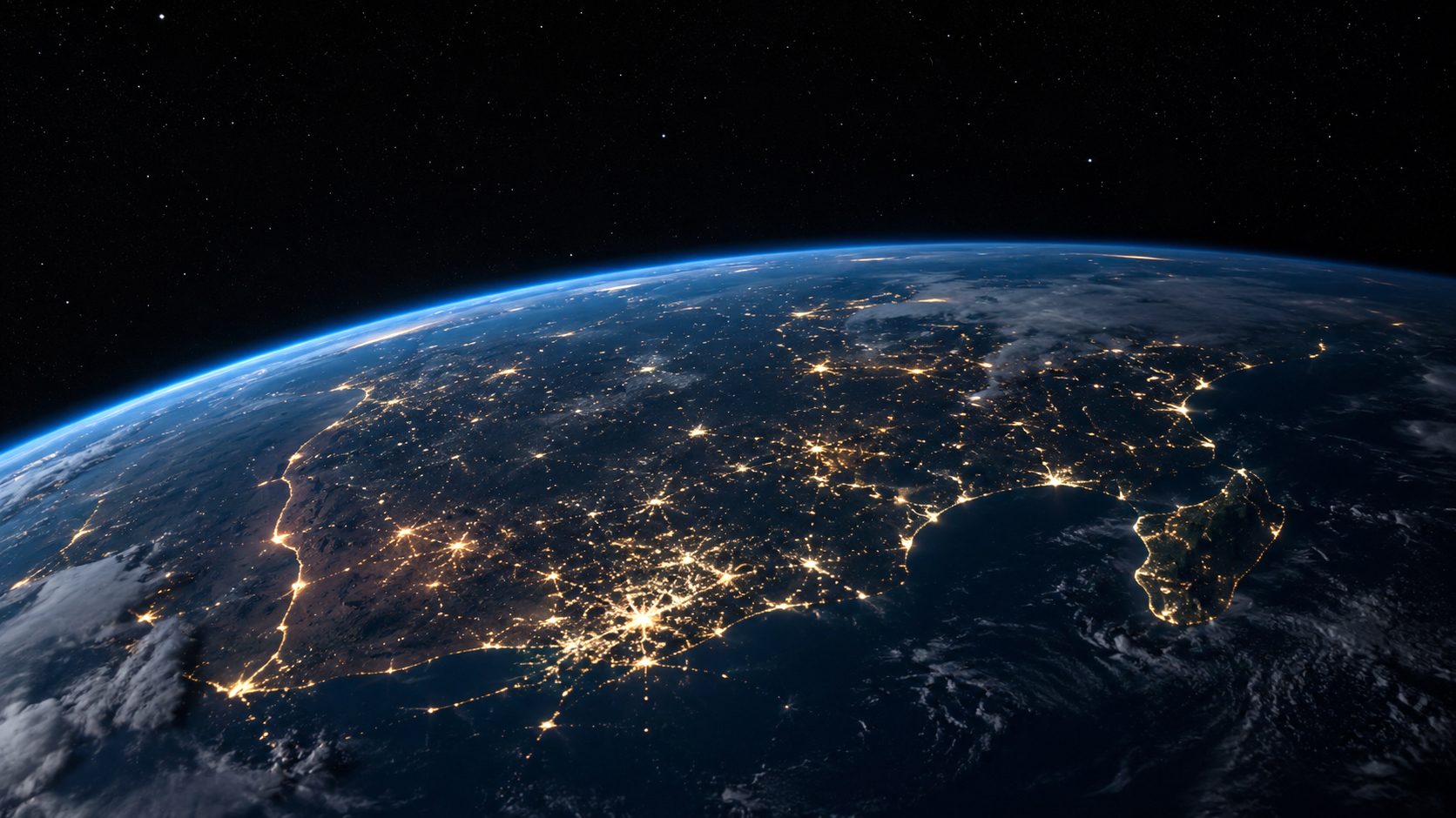Earth seen from space lit up with city lights at night